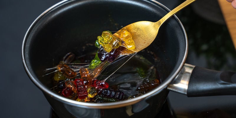 Melt The Gummies: Place The Store-Bought Gummy Bears In A Saucepan Over Low Heat.